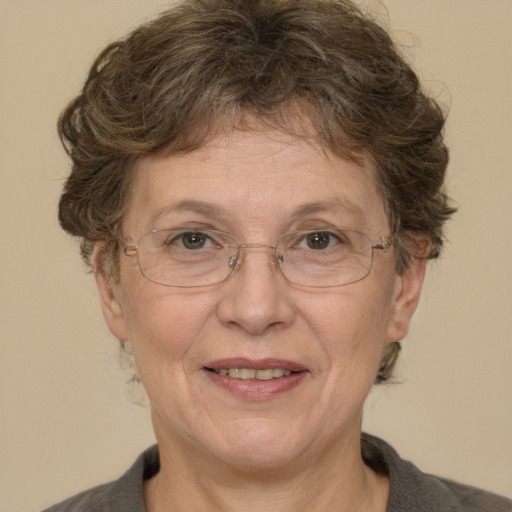 Joyful white middle-aged female with short  brown hair and brown eyes