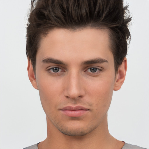 Neutral white young-adult male with short  brown hair and brown eyes