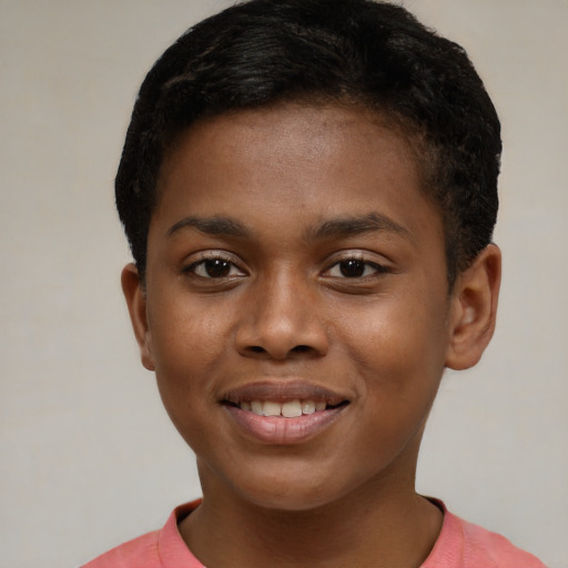 Joyful black child male with short  brown hair and brown eyes