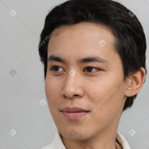 Neutral white young-adult male with short  black hair and brown eyes