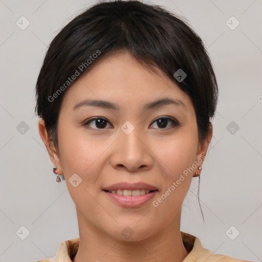 Joyful asian young-adult female with short  brown hair and brown eyes