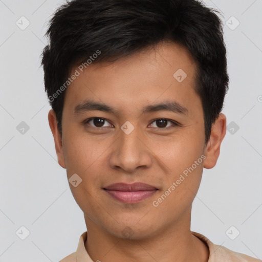 Joyful asian young-adult male with short  brown hair and brown eyes