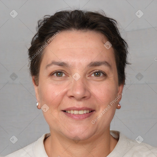 Joyful white adult female with short  brown hair and brown eyes