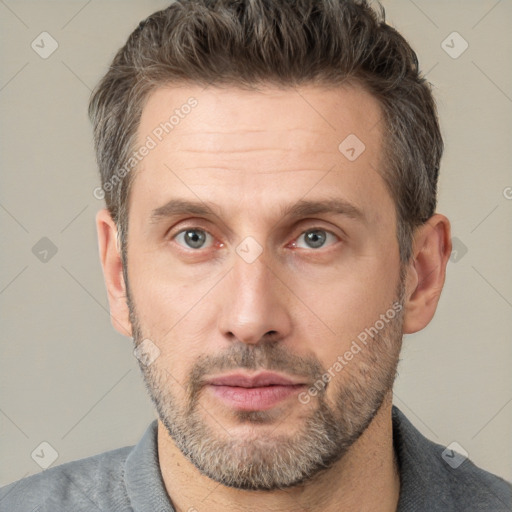 Neutral white adult male with short  brown hair and brown eyes