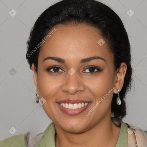 Joyful latino young-adult female with medium  brown hair and brown eyes