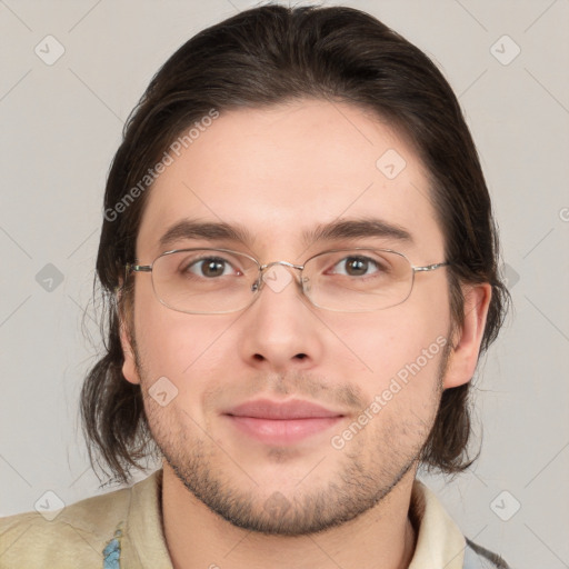 Joyful white young-adult male with medium  brown hair and brown eyes