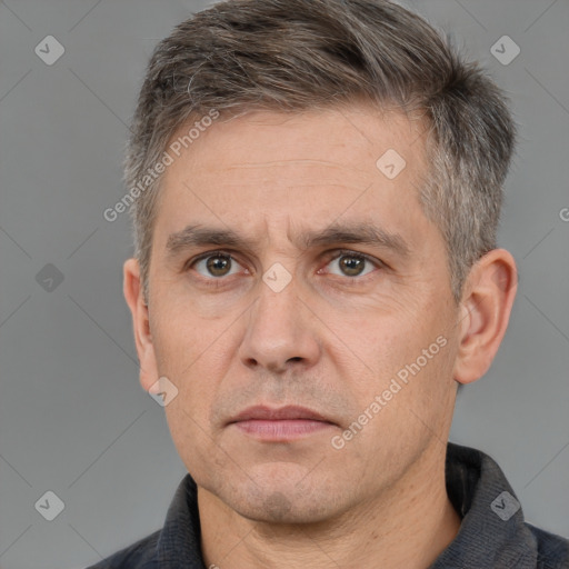 Neutral white adult male with short  brown hair and brown eyes