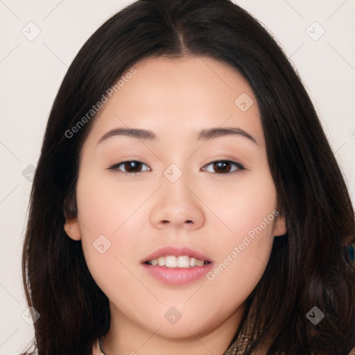 Joyful asian young-adult female with long  brown hair and brown eyes