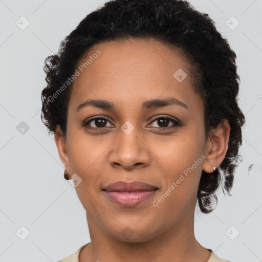 Joyful latino young-adult female with short  brown hair and brown eyes