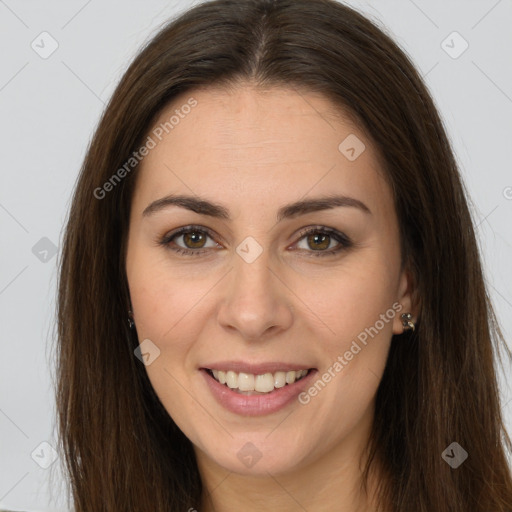 Joyful white young-adult female with long  brown hair and brown eyes