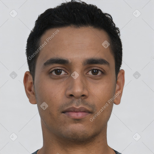 Neutral latino young-adult male with short  black hair and brown eyes