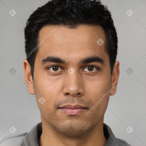 Neutral latino young-adult male with short  black hair and brown eyes