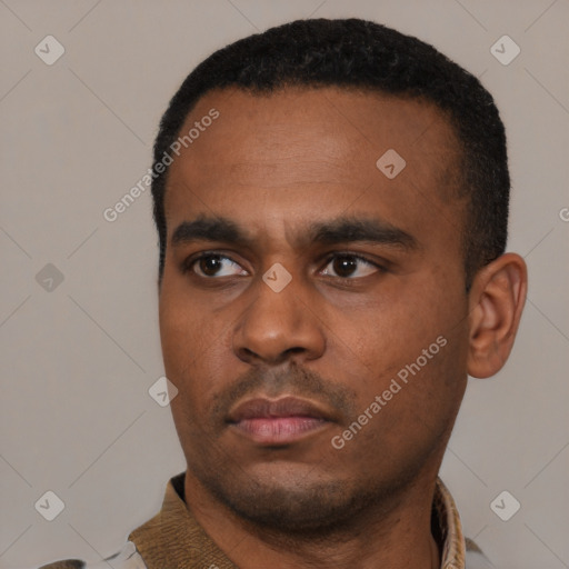 Neutral black young-adult male with short  black hair and brown eyes