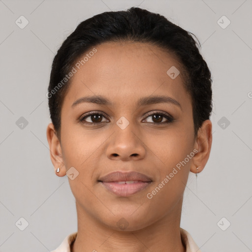 Joyful latino young-adult female with short  brown hair and brown eyes