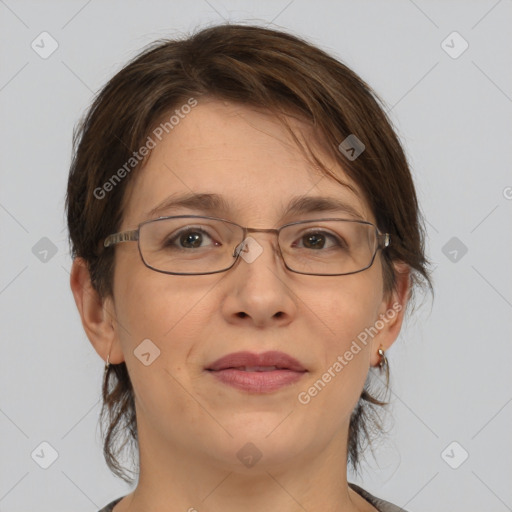 Joyful white adult female with medium  brown hair and brown eyes