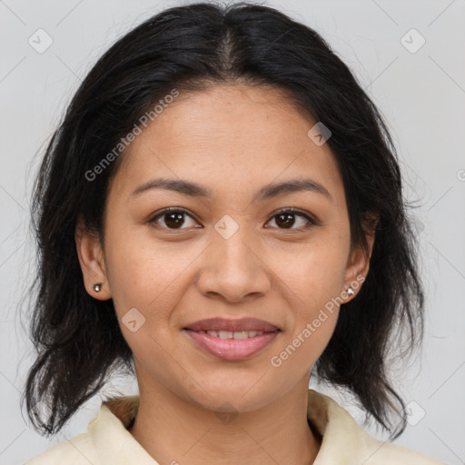 Joyful latino young-adult female with medium  brown hair and brown eyes