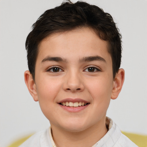 Joyful white child female with short  brown hair and brown eyes