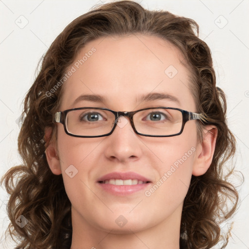 Joyful white young-adult female with medium  brown hair and blue eyes