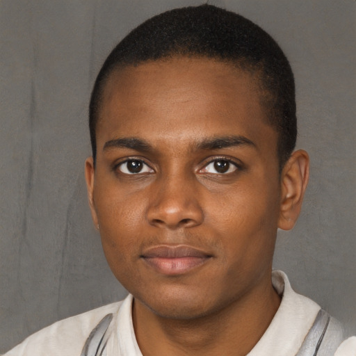 Neutral black young-adult male with short  brown hair and brown eyes