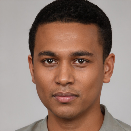 Neutral black young-adult male with short  black hair and brown eyes
