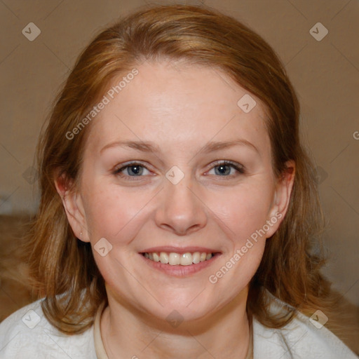 Joyful white young-adult female with medium  brown hair and blue eyes