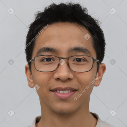 Joyful asian young-adult male with short  brown hair and brown eyes