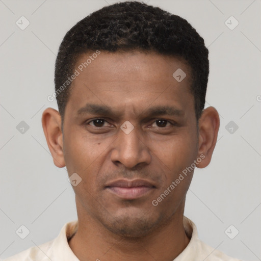 Neutral latino young-adult male with short  black hair and brown eyes