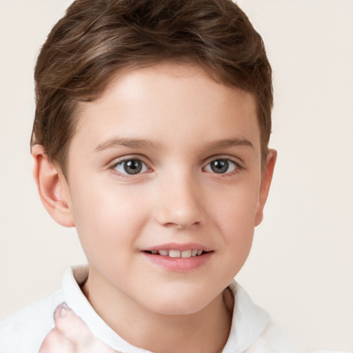 Joyful white child female with short  brown hair and brown eyes