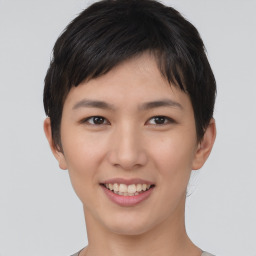 Joyful asian young-adult female with short  brown hair and brown eyes