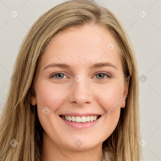 Joyful white young-adult female with long  brown hair and green eyes