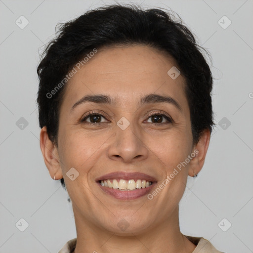 Joyful white adult female with short  brown hair and brown eyes