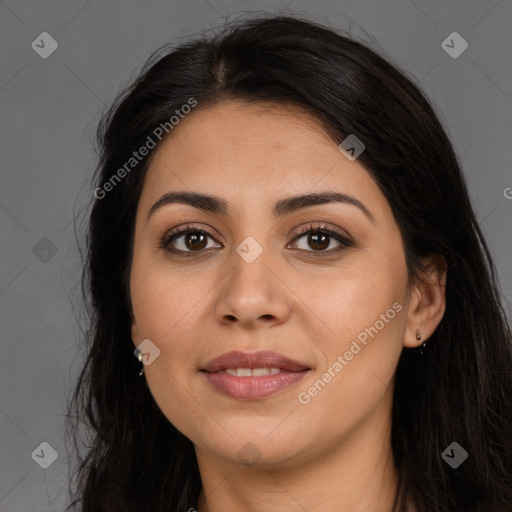 Joyful latino young-adult female with long  brown hair and brown eyes