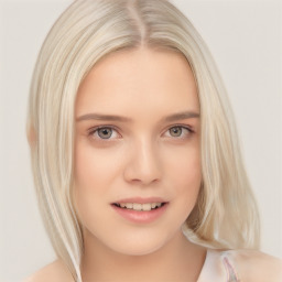Joyful white young-adult female with long  blond hair and brown eyes
