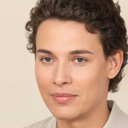 Joyful white young-adult male with medium  brown hair and brown eyes