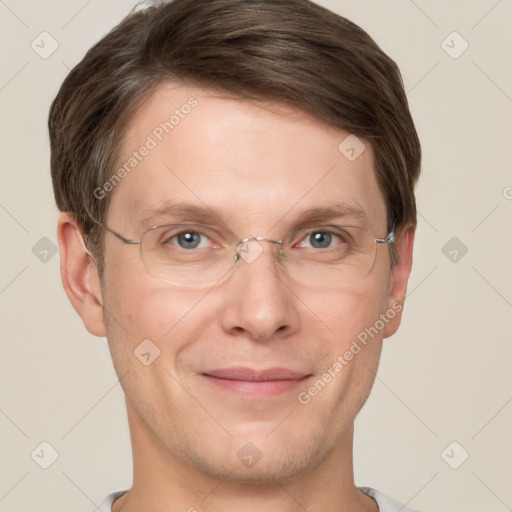 Joyful white adult male with short  brown hair and grey eyes