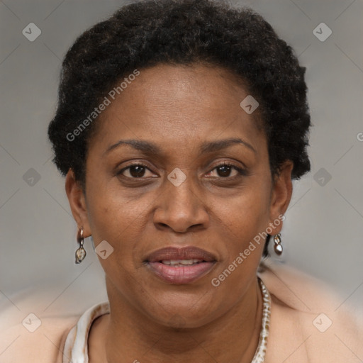 Joyful black adult female with short  brown hair and brown eyes