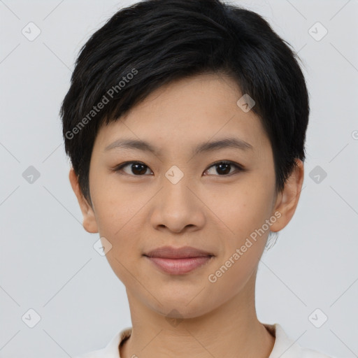 Joyful asian young-adult female with short  black hair and brown eyes