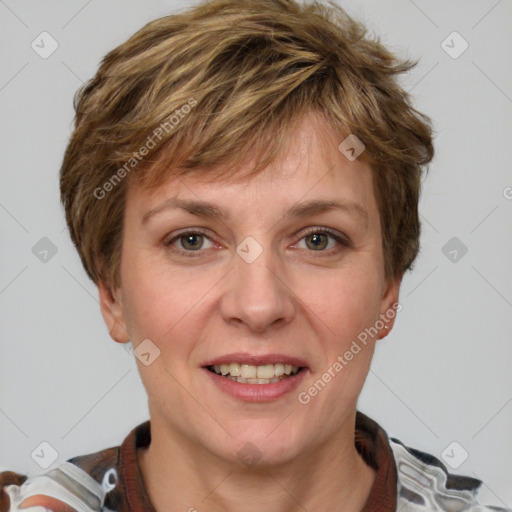 Joyful white adult female with short  brown hair and grey eyes