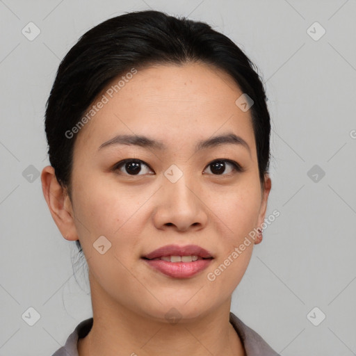 Joyful asian young-adult female with short  brown hair and brown eyes