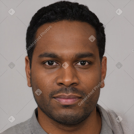 Neutral black young-adult male with short  black hair and brown eyes
