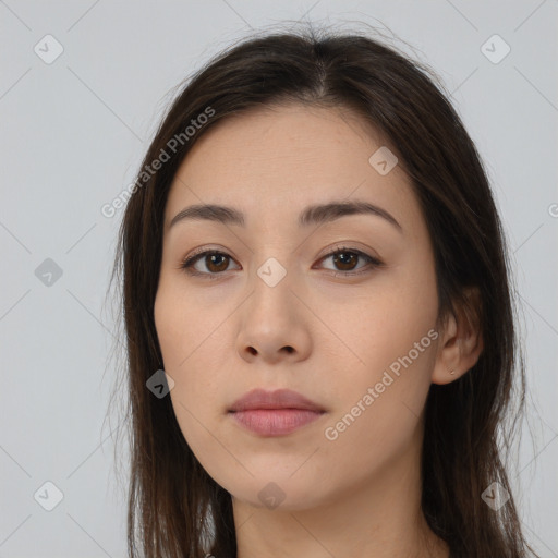 Neutral white young-adult female with long  brown hair and brown eyes