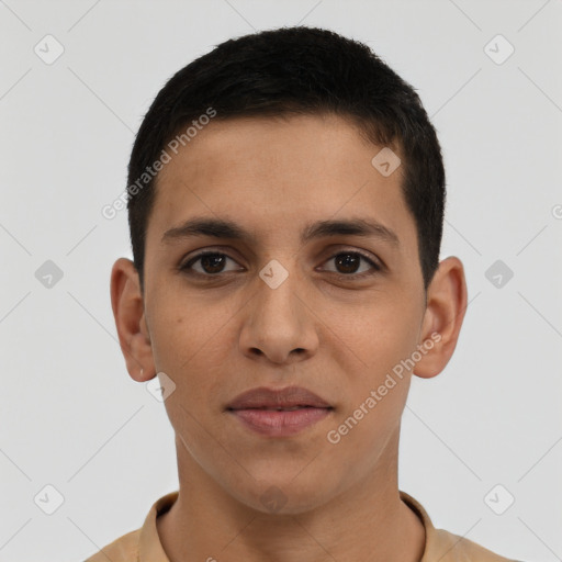 Joyful latino young-adult male with short  brown hair and brown eyes