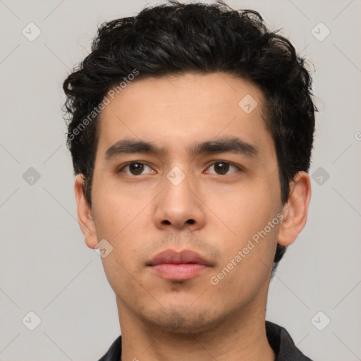 Neutral white young-adult male with short  black hair and brown eyes