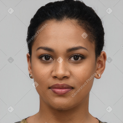 Joyful latino young-adult female with short  brown hair and brown eyes