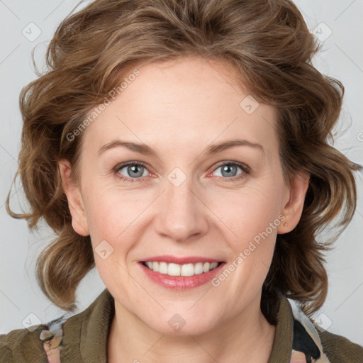 Joyful white young-adult female with medium  brown hair and blue eyes