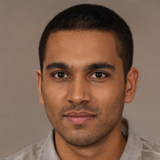 Neutral black young-adult male with short  brown hair and brown eyes