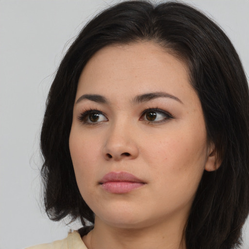 Neutral asian young-adult female with long  brown hair and brown eyes