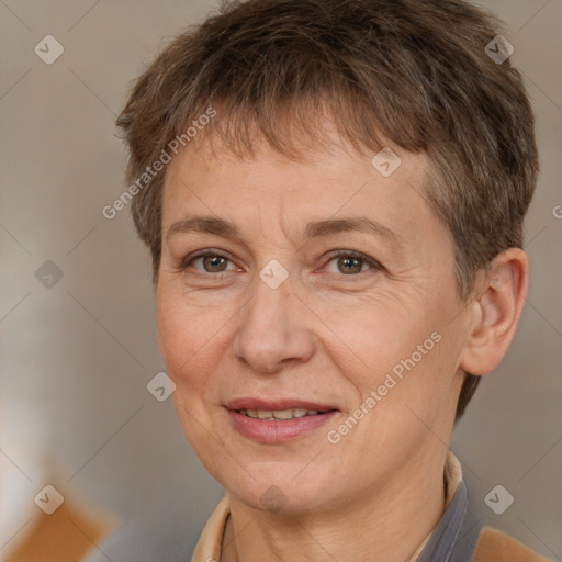 Joyful white adult female with short  brown hair and brown eyes