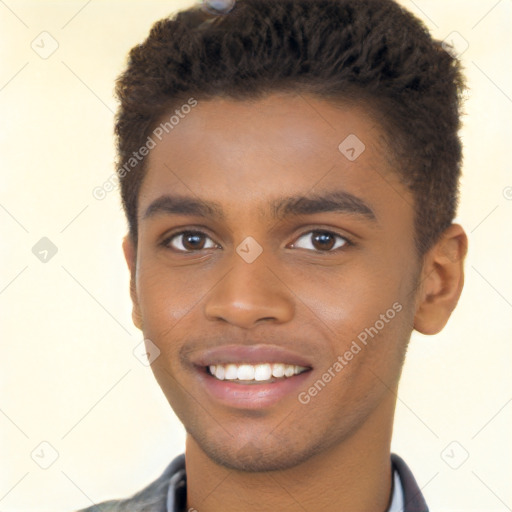 Joyful black young-adult male with short  brown hair and brown eyes