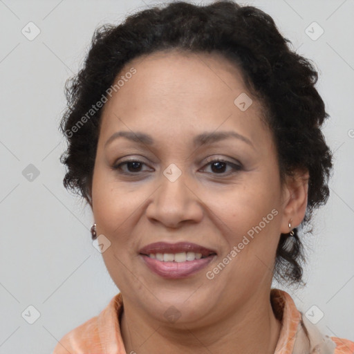 Joyful latino adult female with short  brown hair and brown eyes